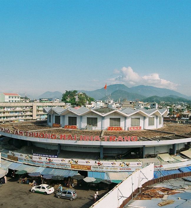 An image of a market that is three storey round building - Alibu Resort Nha Thrang