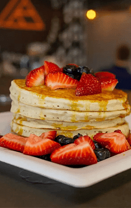 A close-up shot of pancakes at Nirvana Luxury Hotel, Ludhiana.