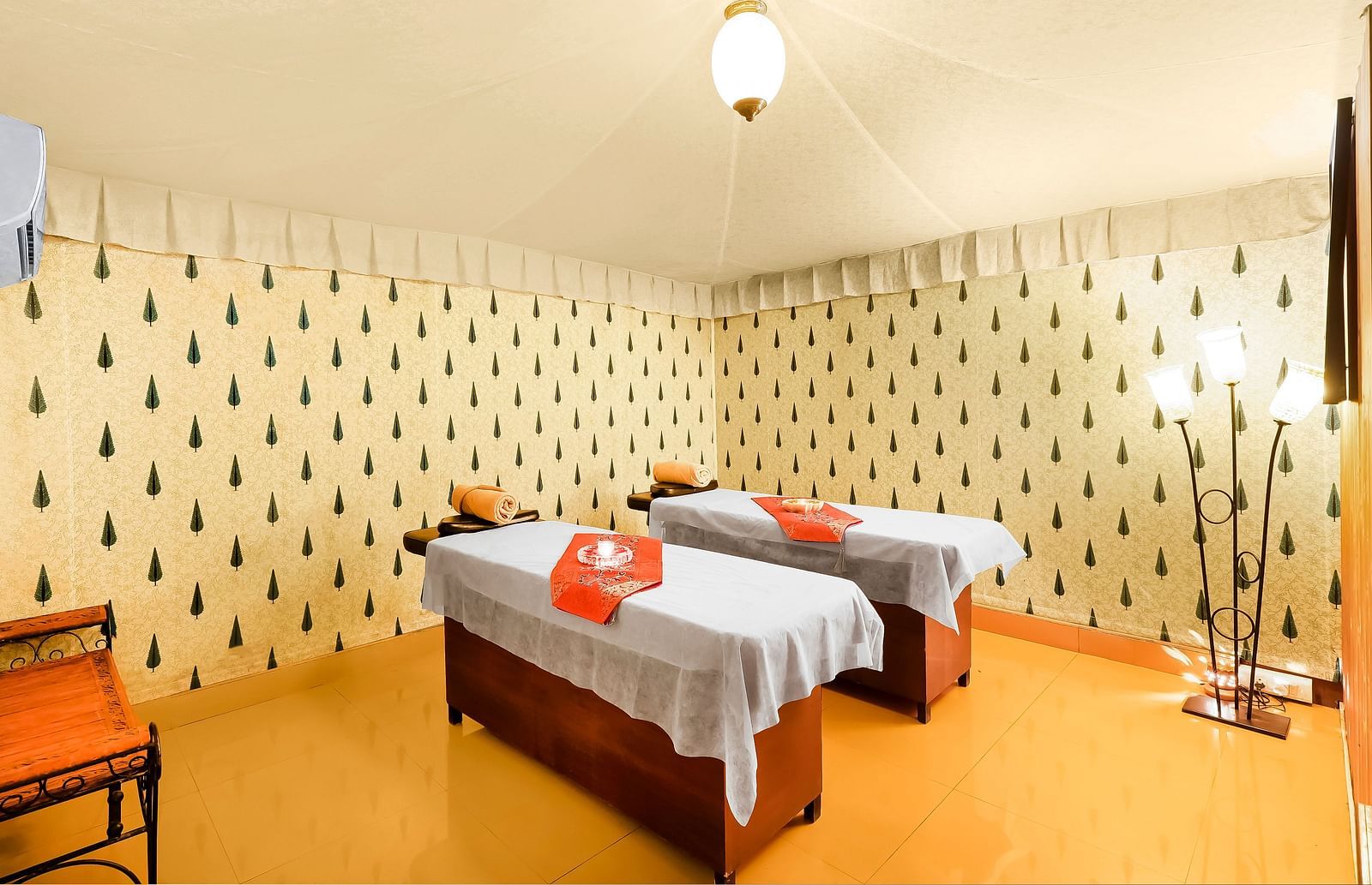 An overview of the spa room with two massage beds next to each other - Rajasthali Resort & Spa, Jaipur.