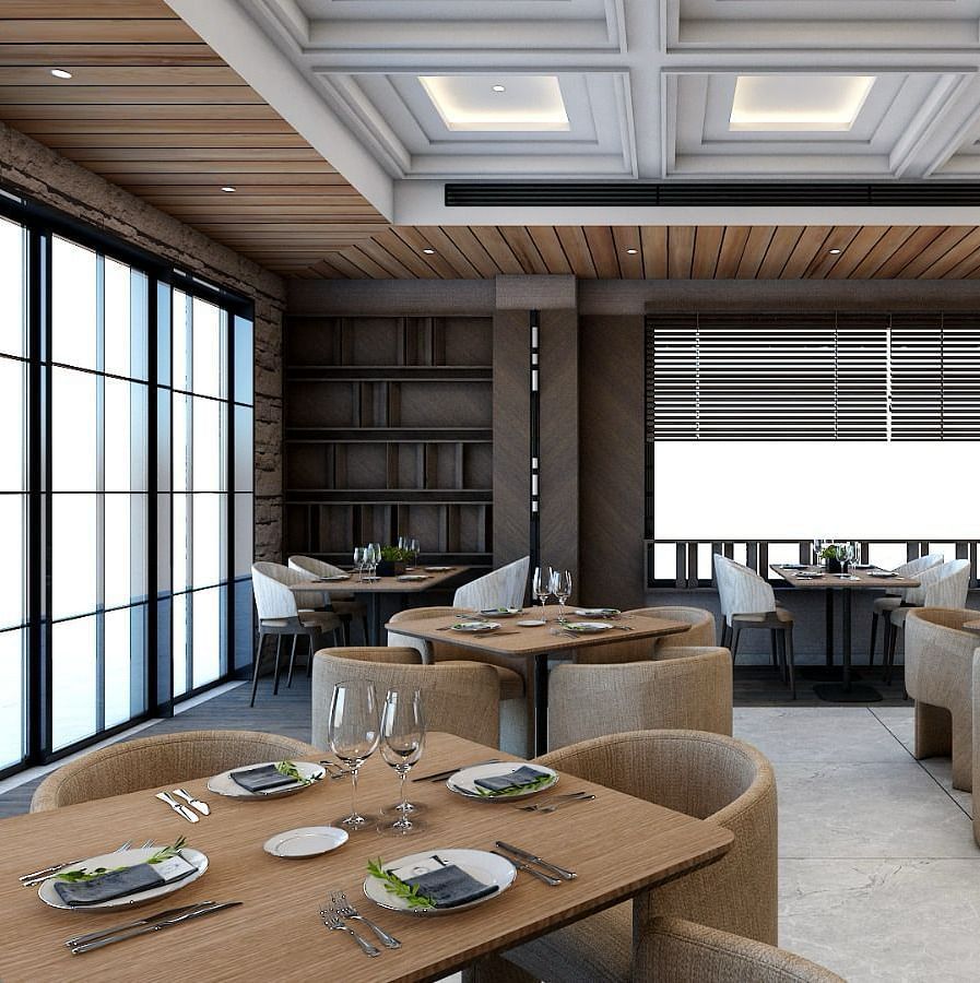 Dining tables placed besides the huge windows emitting plenty of natural light from outside - Namaste Corbett 