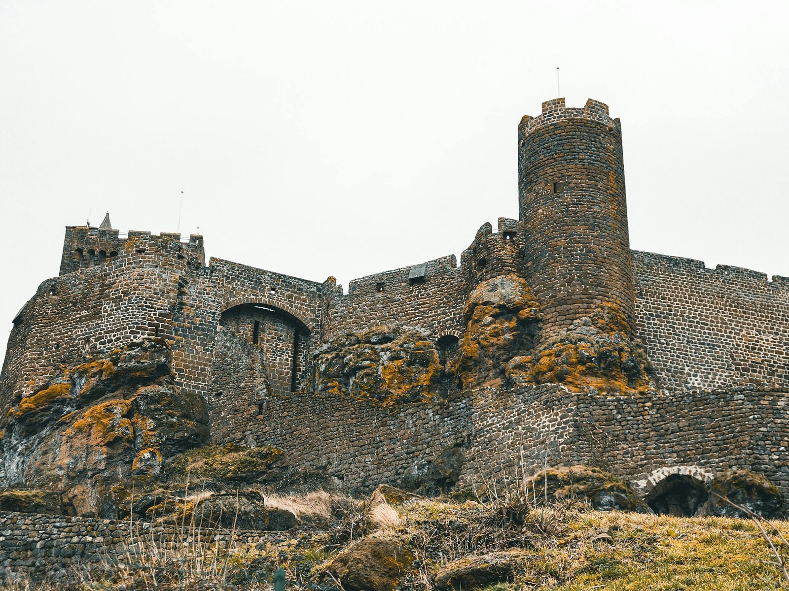 An ant's-eye view of a fort against the sky