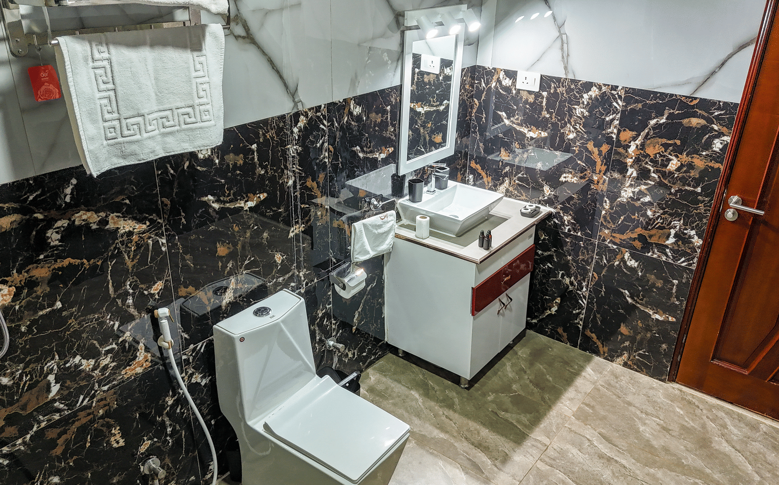 Modern bathroom with a water closet and sink in a confined space - Luffu Club