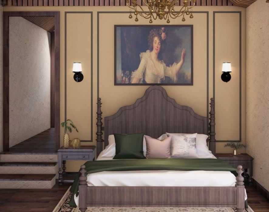 Opulent bedroom with a velvet upholstered headboard, classic picture frame mouldings, and a large portrait above the bed at BluSalzz Terrah Hills Resort, Dalhousie.