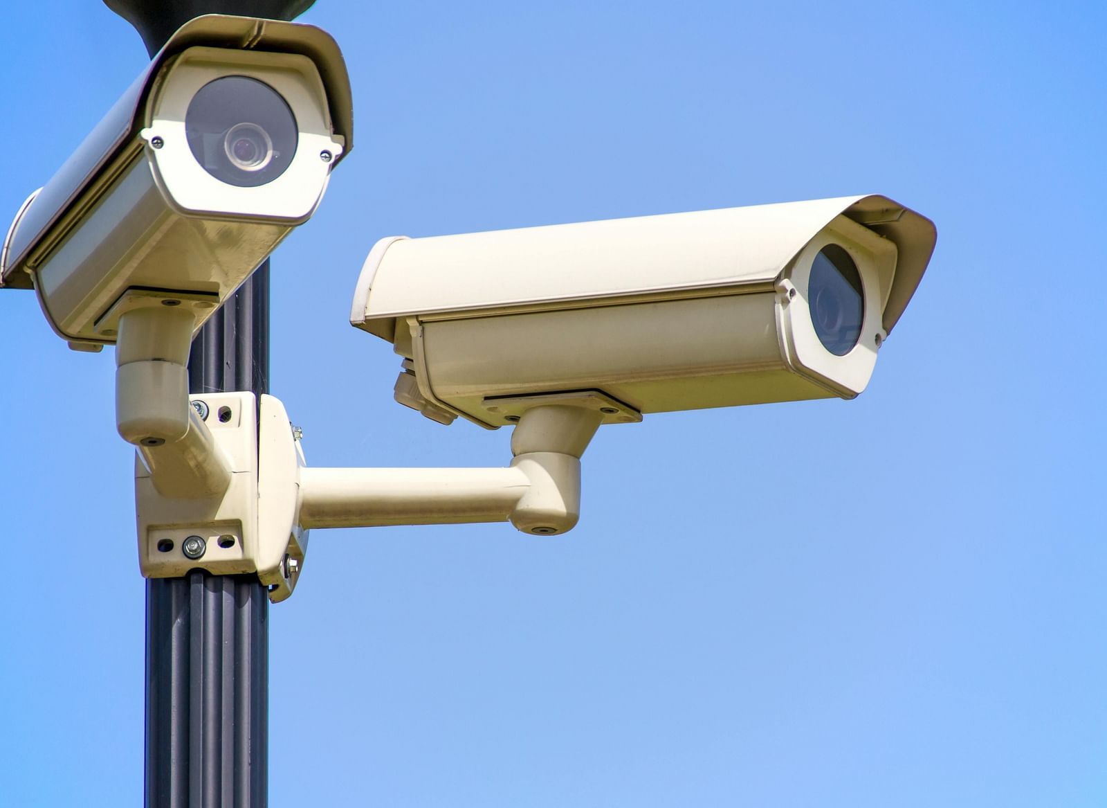 An image of two CCTV cameras fixed on a pole