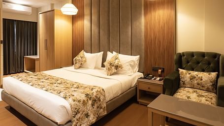 A double bed inside executive room - The Cindrella Hotel, Siliguri