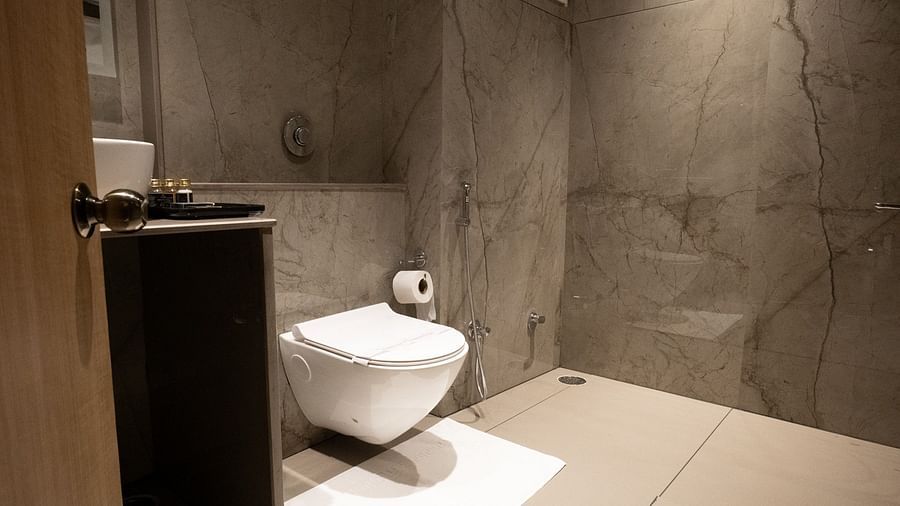 Overview of the bathroom with the shower area in view inside executive room - The Cindrella Hotel, Siliguri