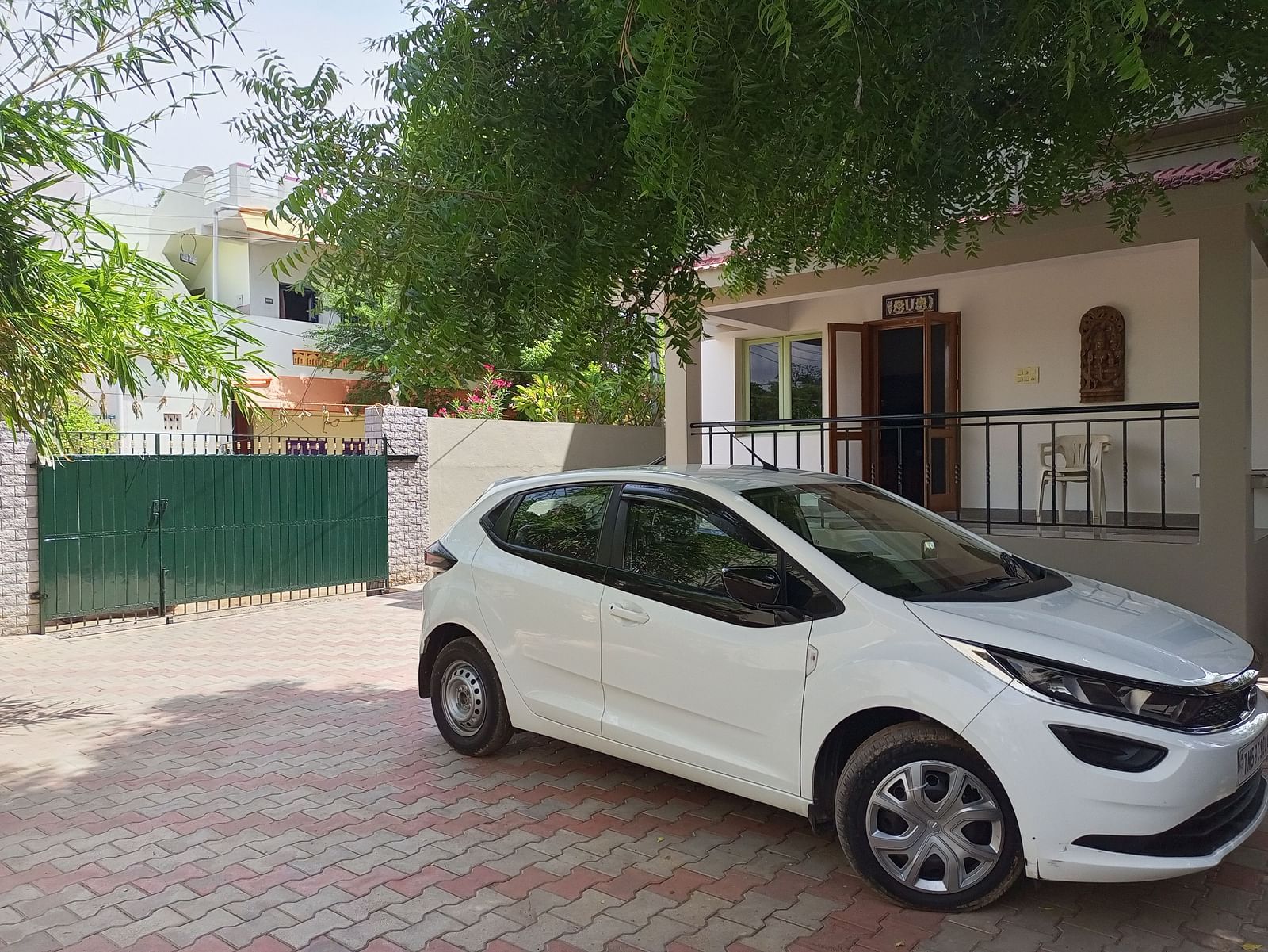 The car parking area with a car parked at our hotel - Wyt Hotels Transit Nest