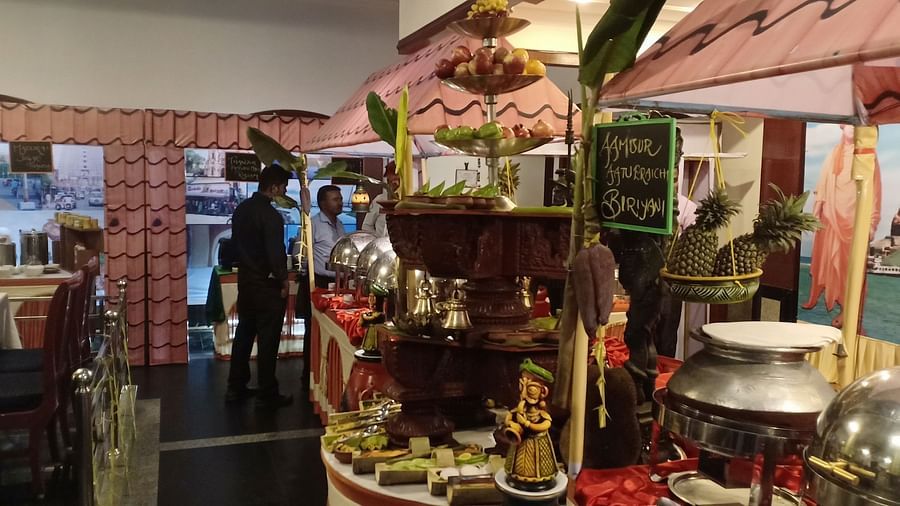 Food tower with a variety of foods at SRM Hotel Tiruchirappalli- Hotel 
