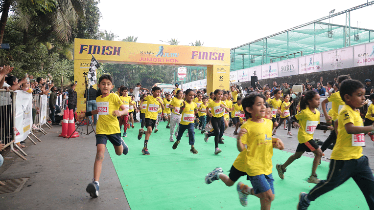 Image of  kids running in junior marathon at  IOSIS