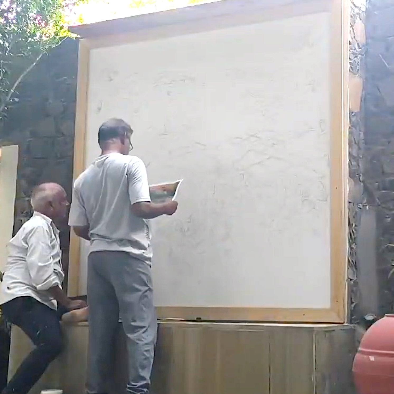 Artists preparing the base sketch for the naturalist map at Utsav Camp Sariska.