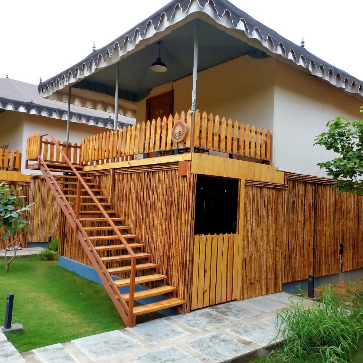 wooden stairs beside a wooden open door 2