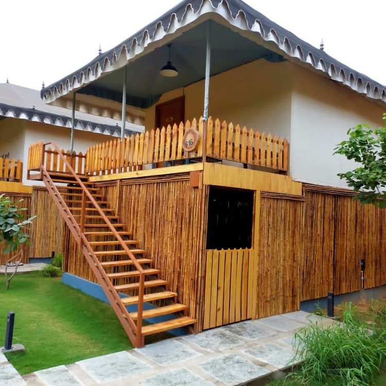 wooden stairs beside a wooden open door 2