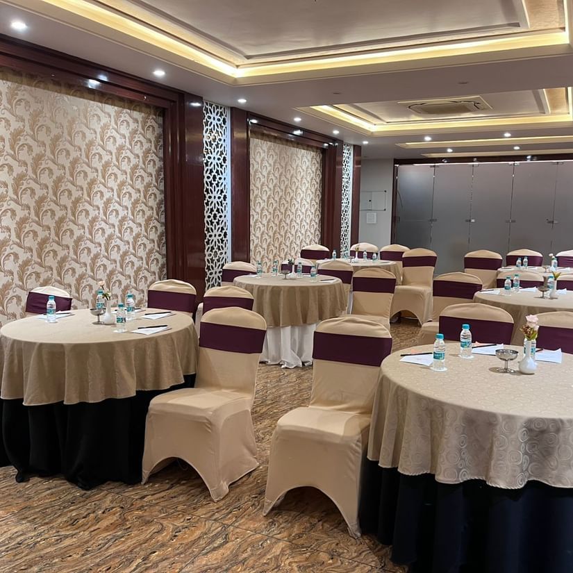 Banquet hall with round table setup at Five Elements Hotel, perfect for formal dinners, social events, and intimate gatherings.