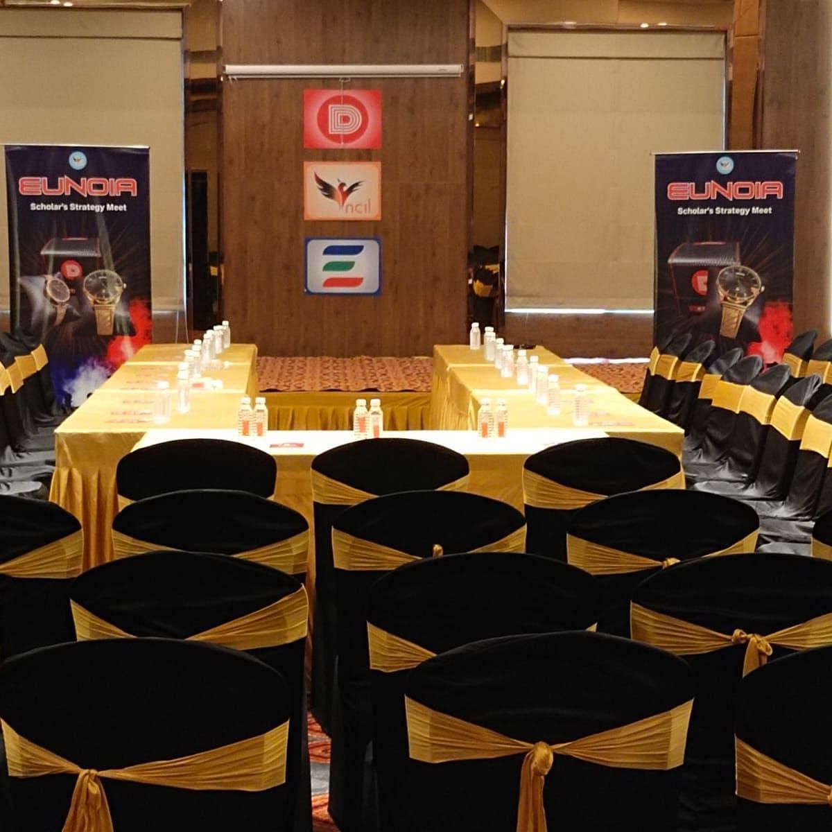A well furnished, modern event hall with the capacity to seat large group of people  in Lords Eco Inn Shapar Rajkot.