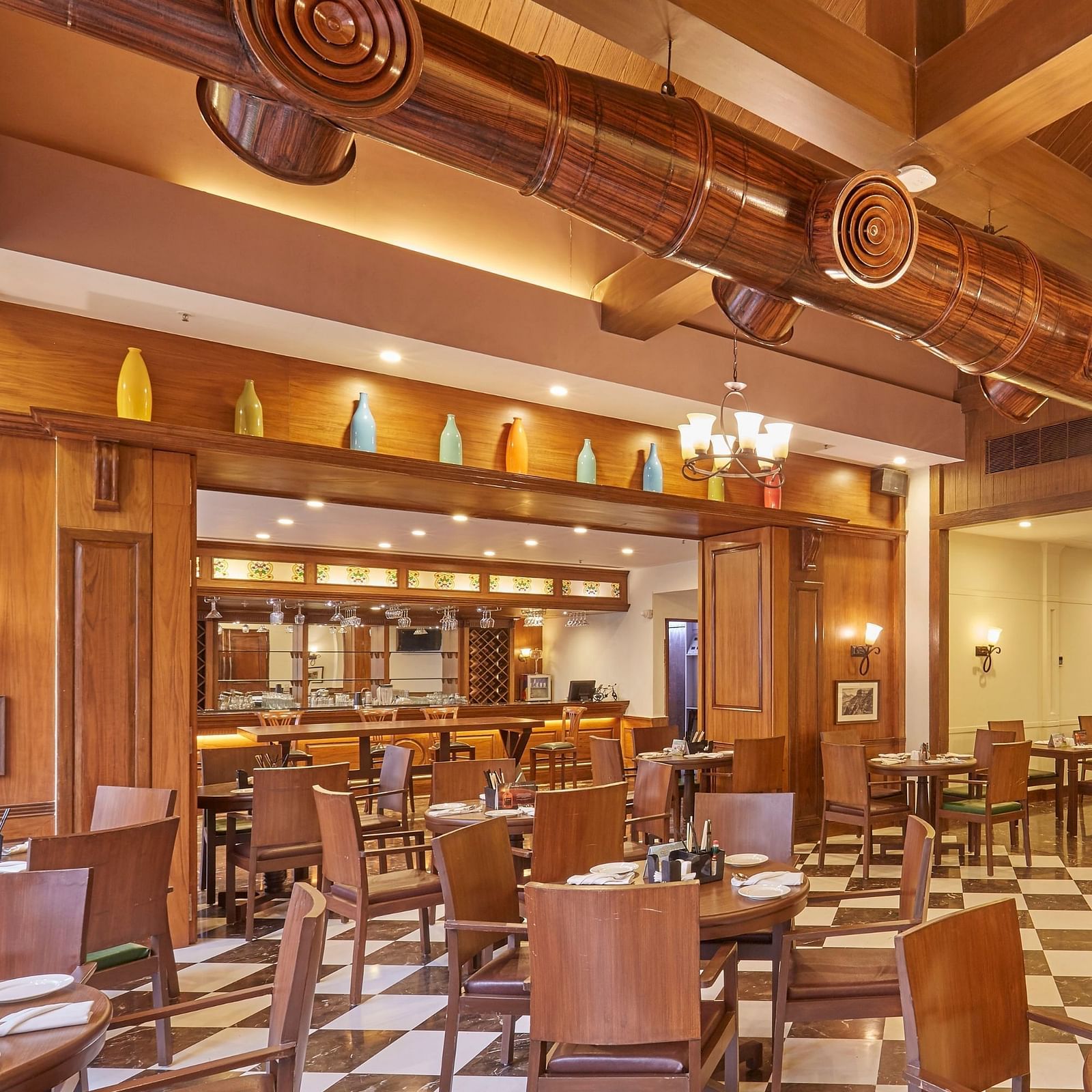 an image of a cedar, the Lonavala restaurant and bar, features aesthetically designed interiors - Rhythm Lonavala