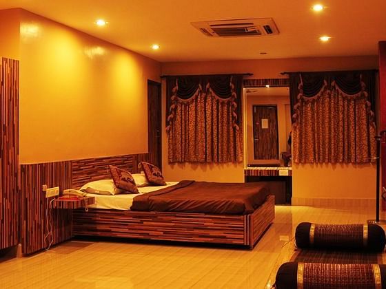 Maharaja Room with yellow hued lighting