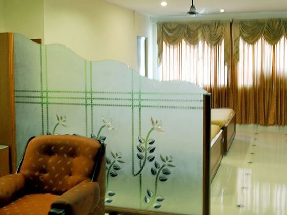 Luxurious Royal Room at Udipi Home with elegant furnishings and ample space for families