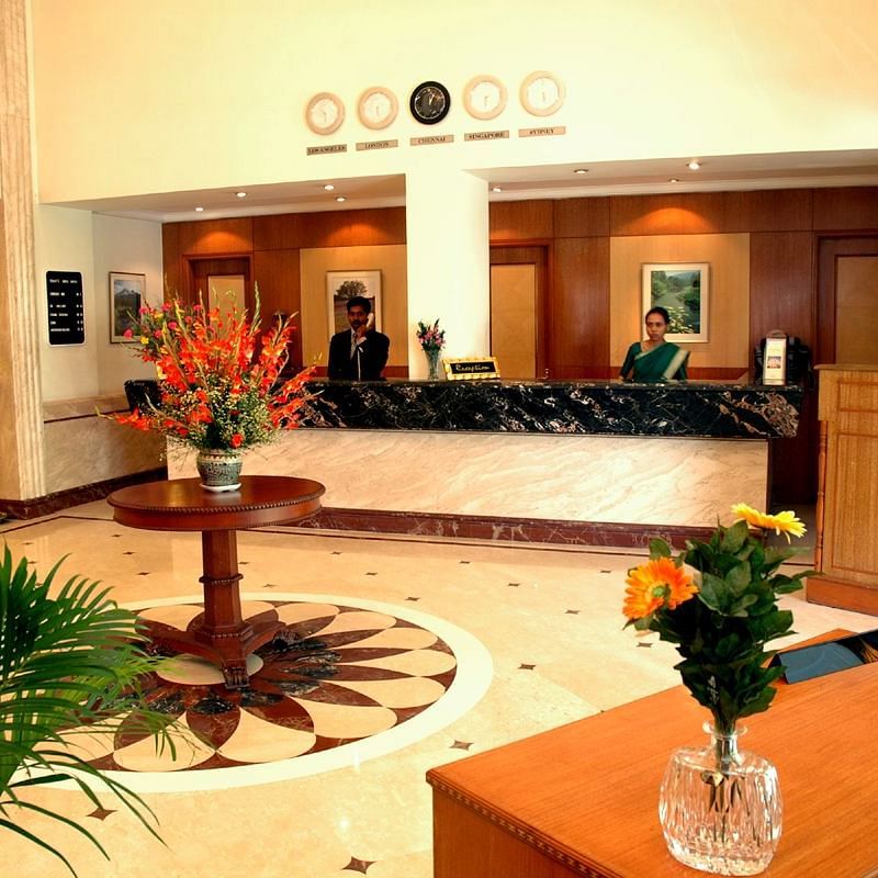 Lobby with plants at Beverly Hotel Chennai