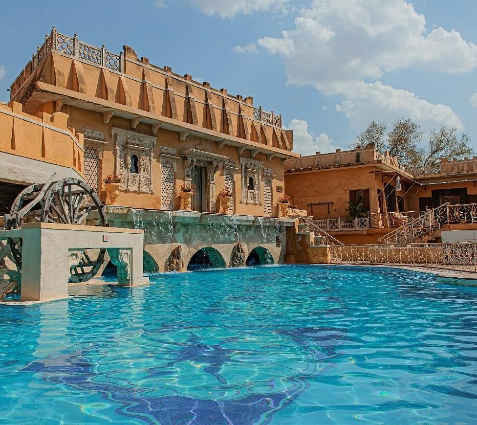 A pool side view of Ajit Bhawan