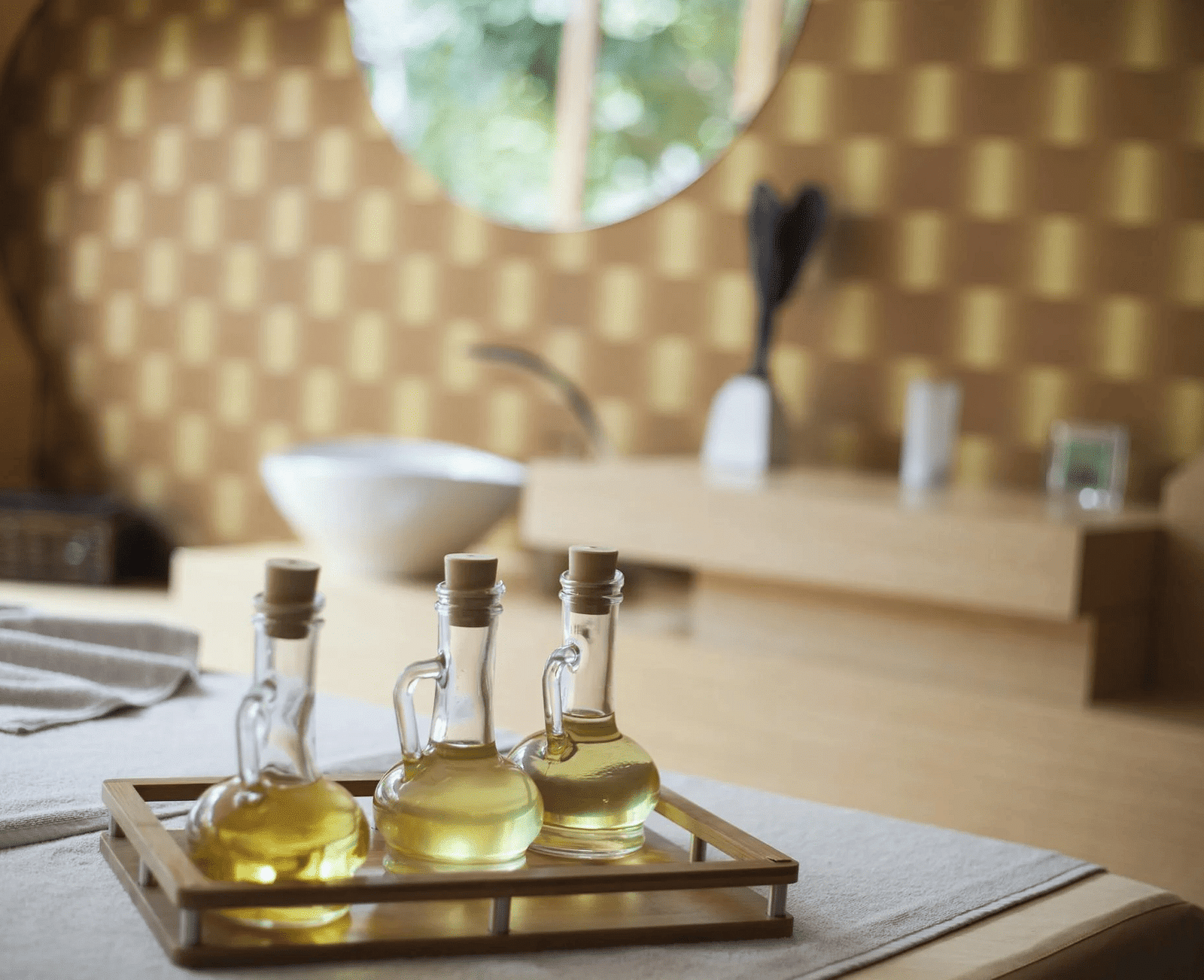 Image of three glass containers filled with liquid.