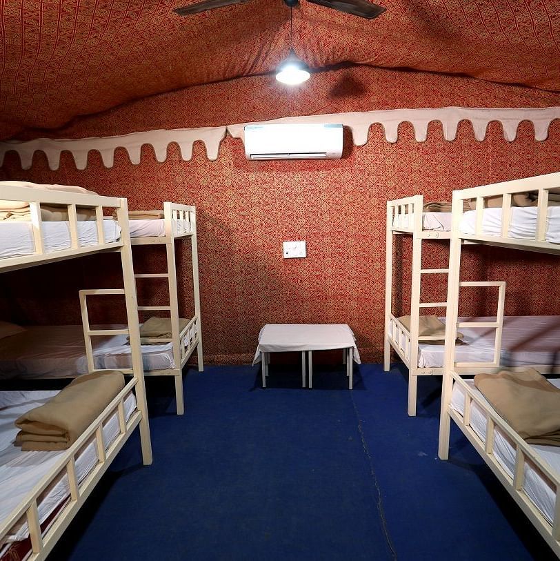 AC Tents Interior - Sajan - AC Dormitory Tents at Nature Trails Sajan offering a comfortable yet adventurous group stay experience.