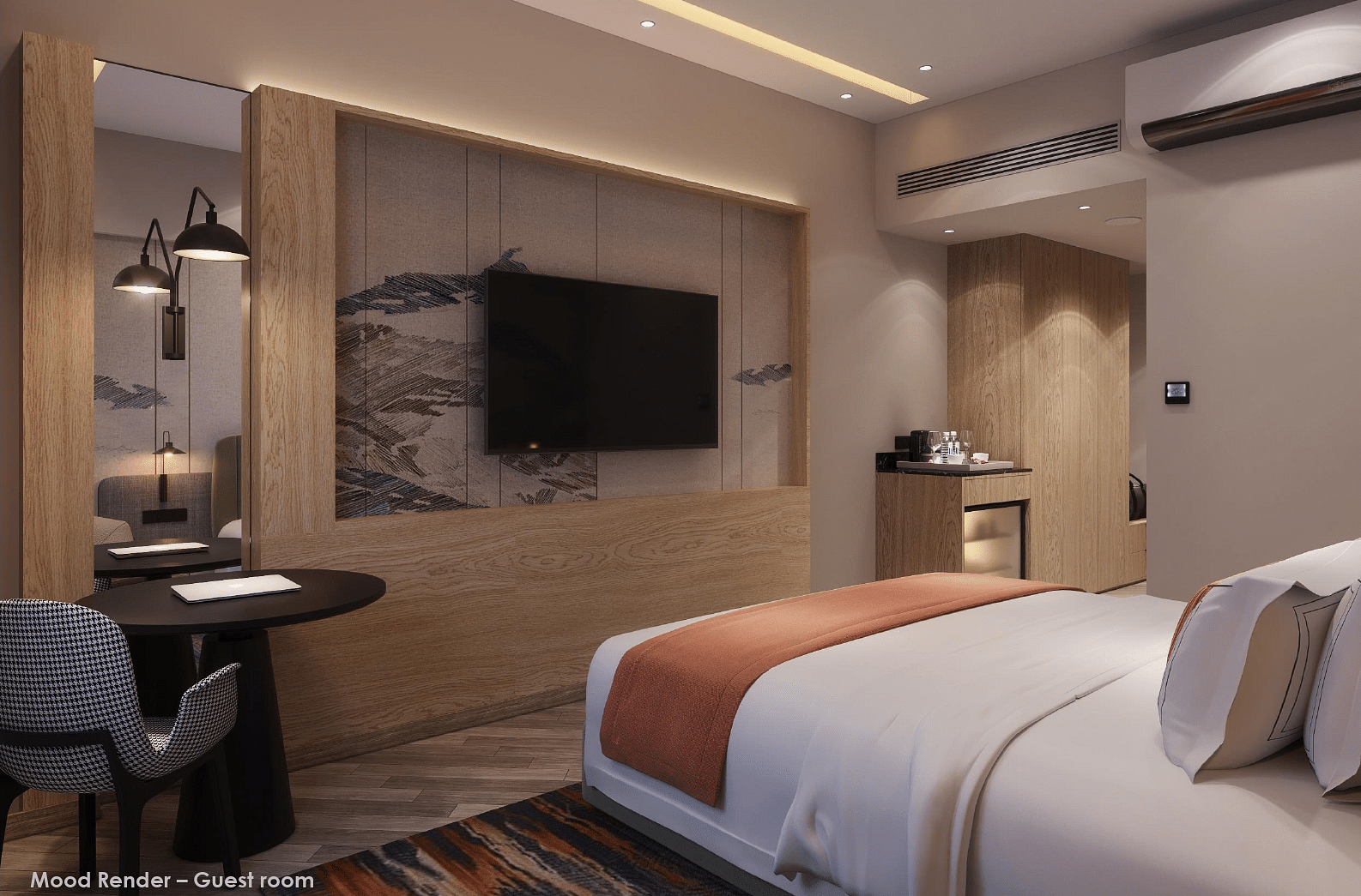 Image of a room with bed with a television in front.