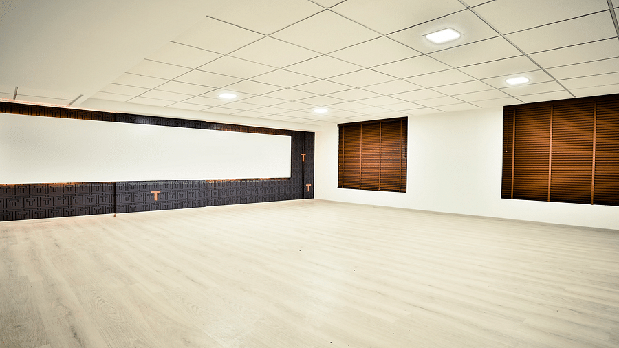A well-lit empty event space at T24 Residency, Andheri East, Mumbai