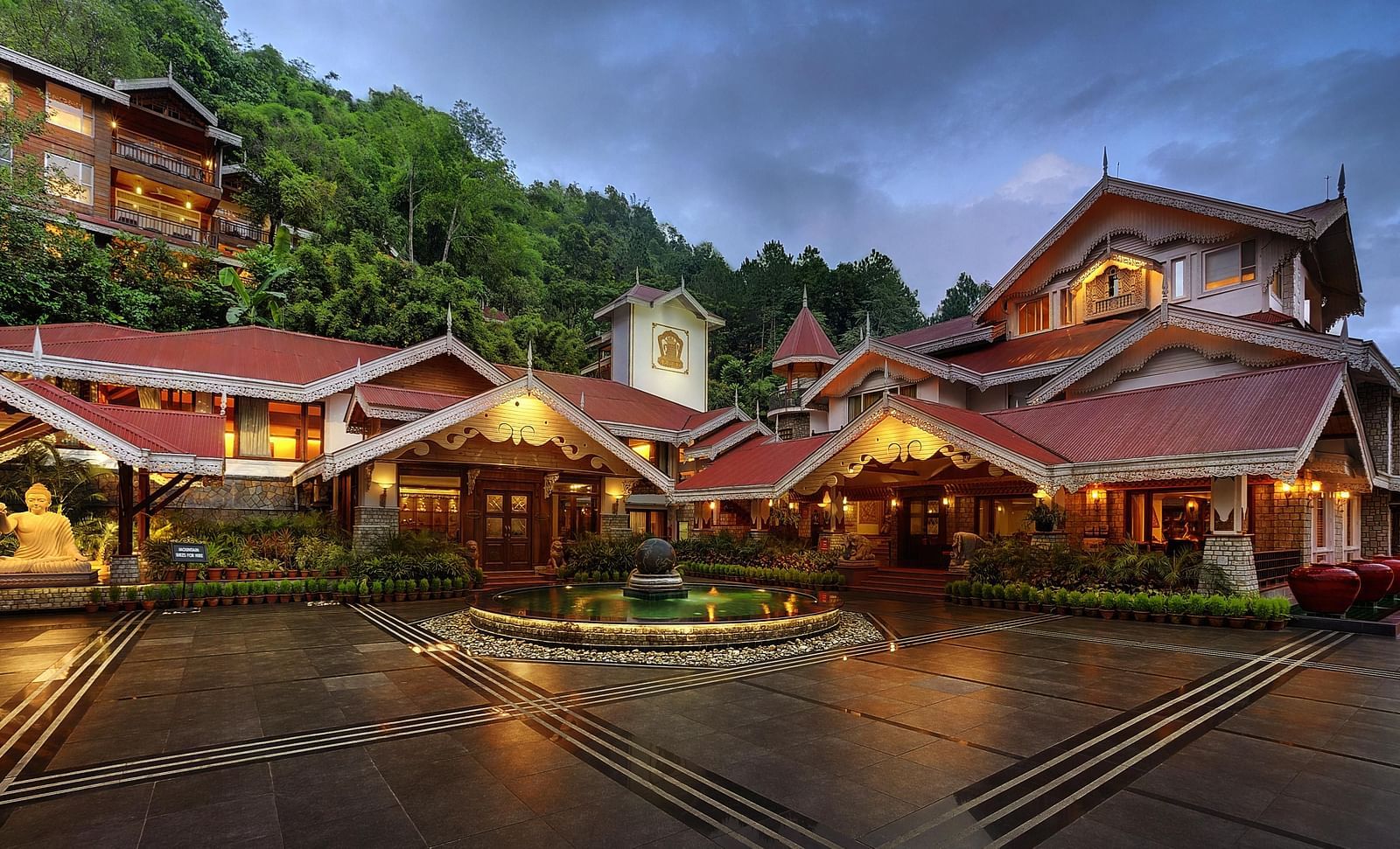 the exterior facade during night time -  Mayfair Spa Resort & Casino Gangtok 