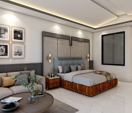 A spacious room featuring a double bed alongside a common seating area. - Namaste Corbett