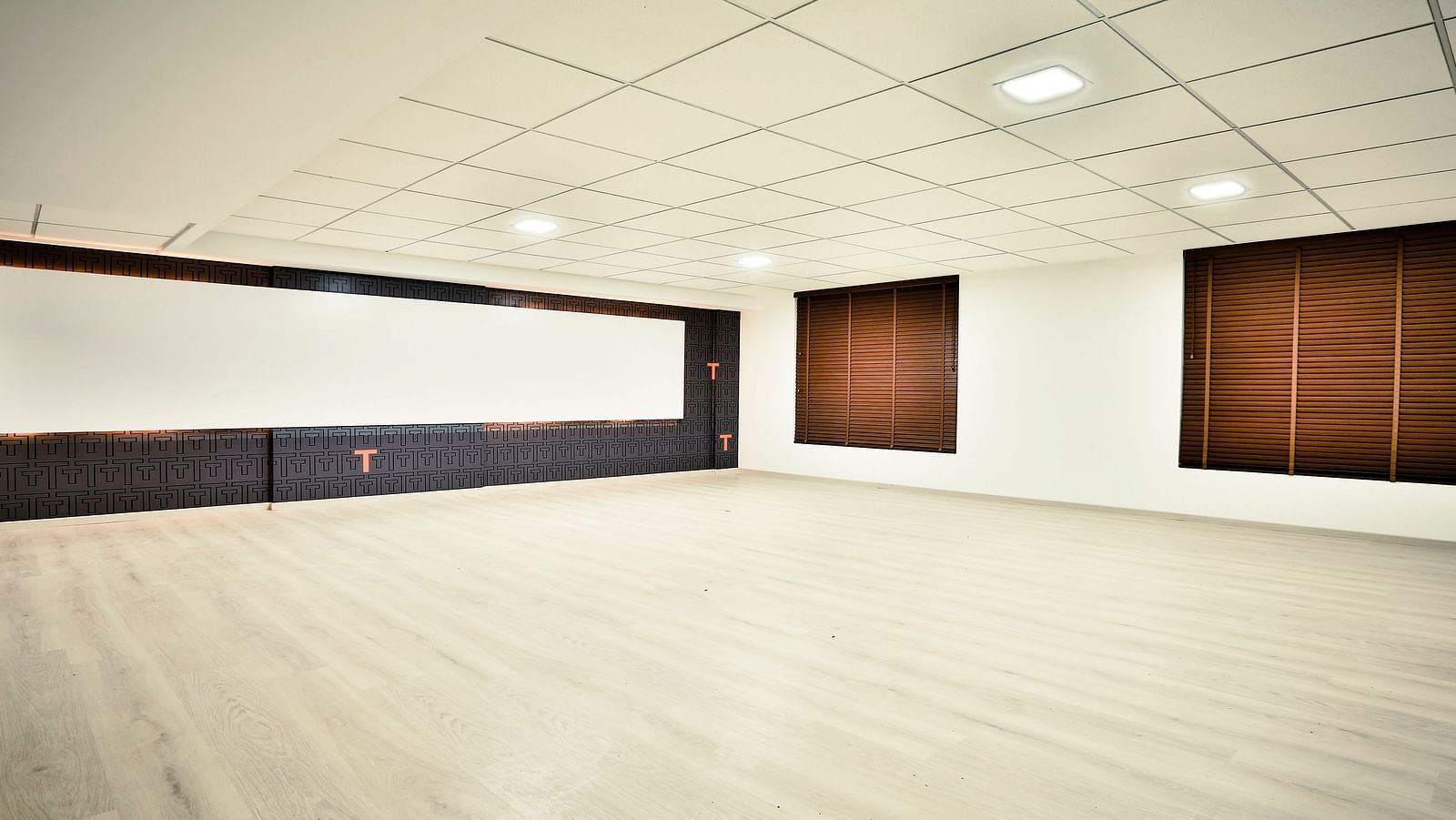A well-lit empty event space at T24 Residency, Andheri East, Mumbai
