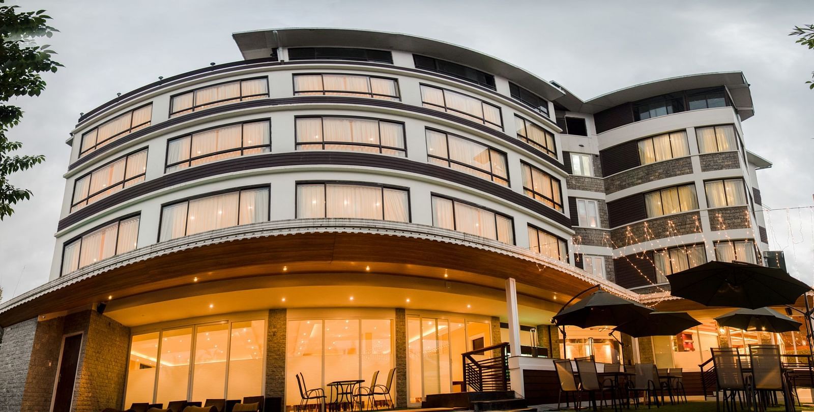 A beautifully illuminated multi-storey hotel with a contemporary architectural design - Summit North Star, Gangtok