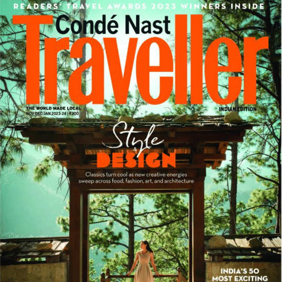 Conde Nast Traveller India magazine cover featuring a tropical entrance with wooden gates surrounded by lush greenery, titled -State of Design.
