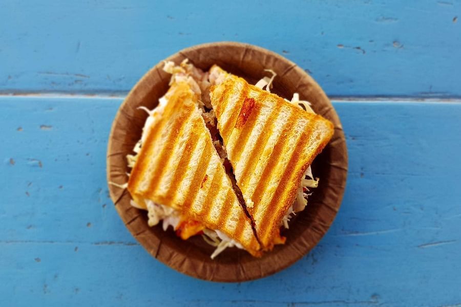 a plate of grilled sandwich