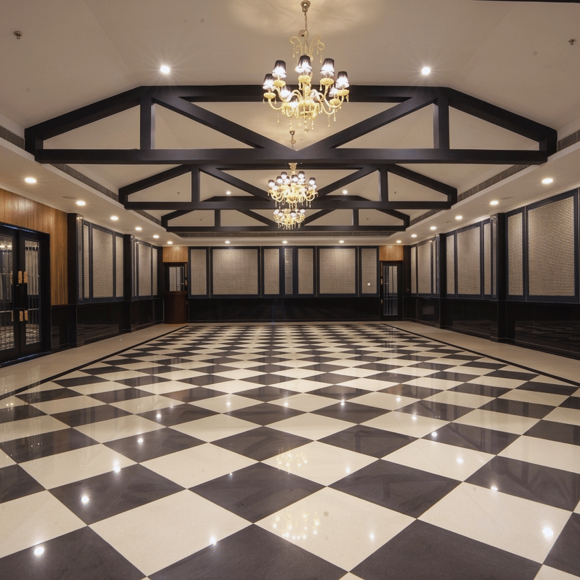 Grand convention hall with black and white checkered flooring at MAYFAIR Oasis Resort and Convention Jharsuguda