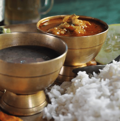 A close up shot of Dal Bhati served on a plate.