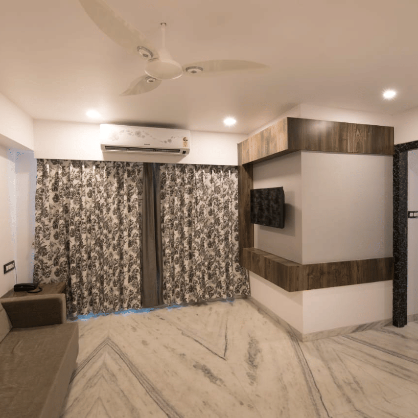 Living area of  Royal suite at sanmukh by adamo with its clean ambience and modern interiors.