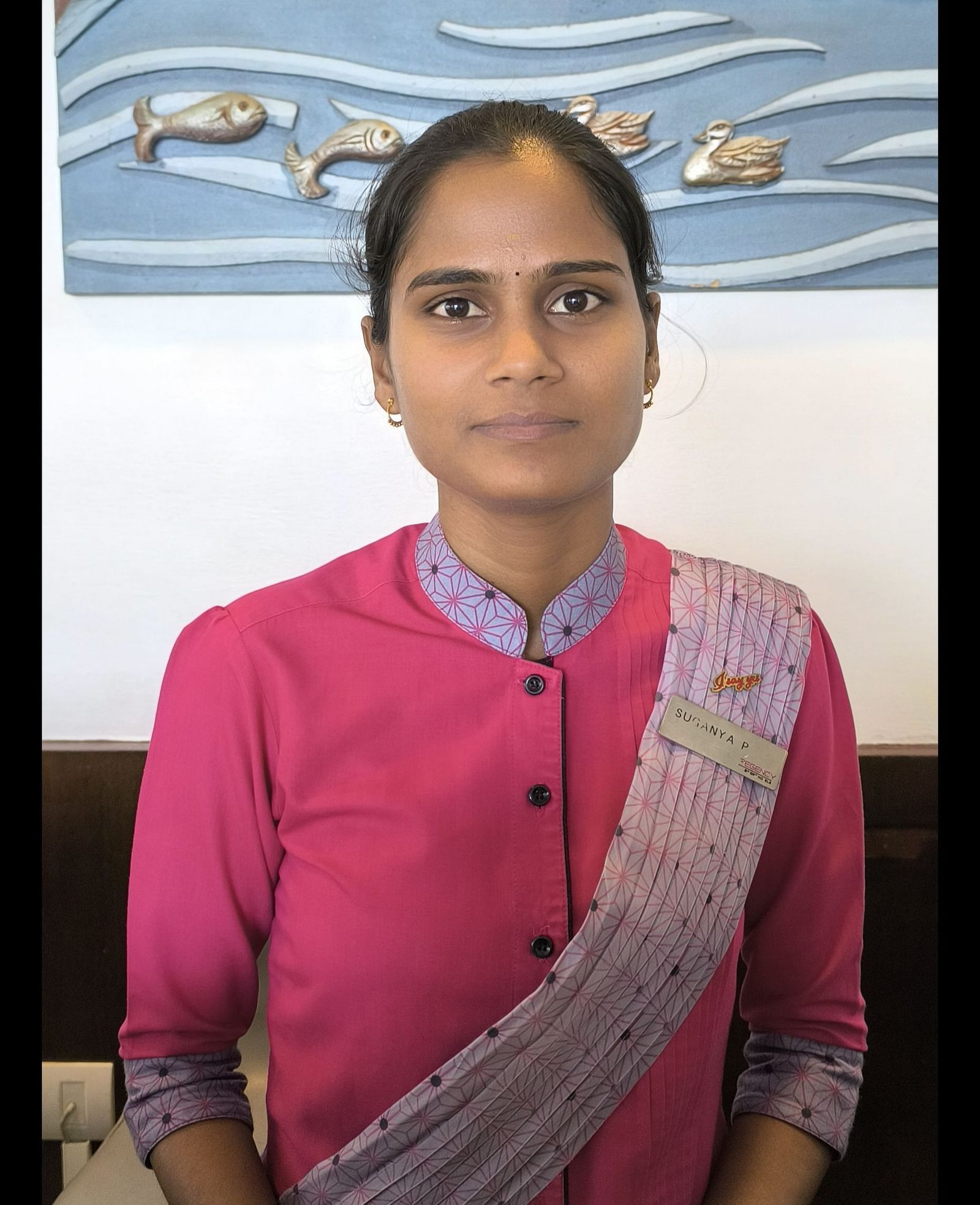 A photo of Ms.Suganya ( Frontoffice).