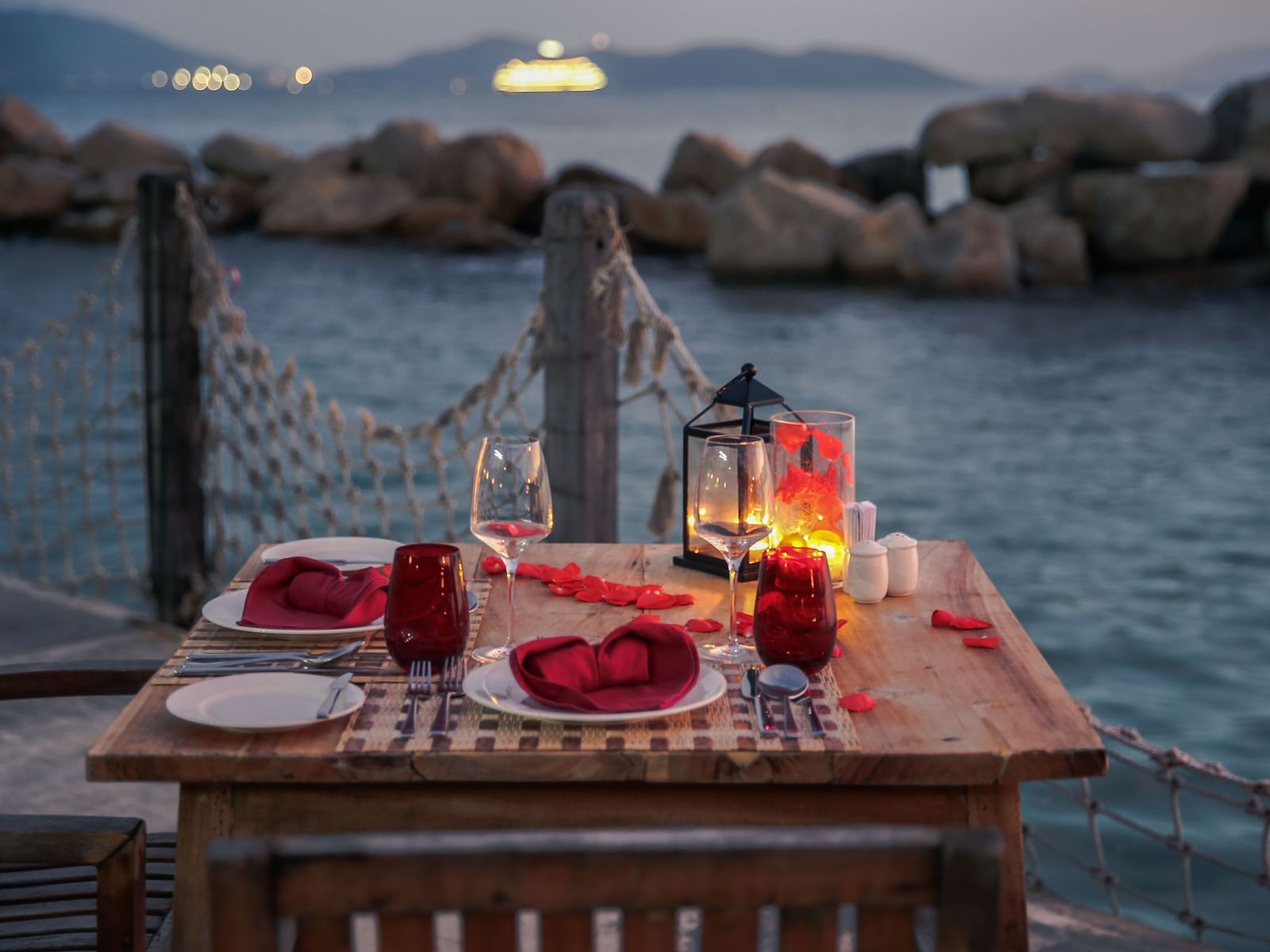 A candle light dinner setup by the Nha Trang bay - Alibu Resort Nha Trang