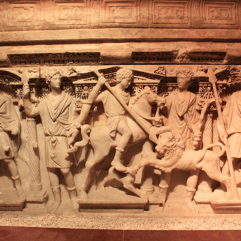 Stone relief sculpture depicting a dramatic historical or mythological scene.