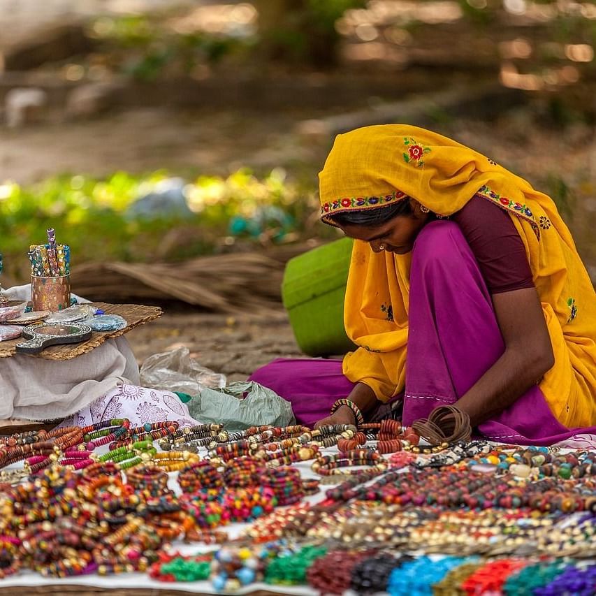 A woman selling jewellery on the street
