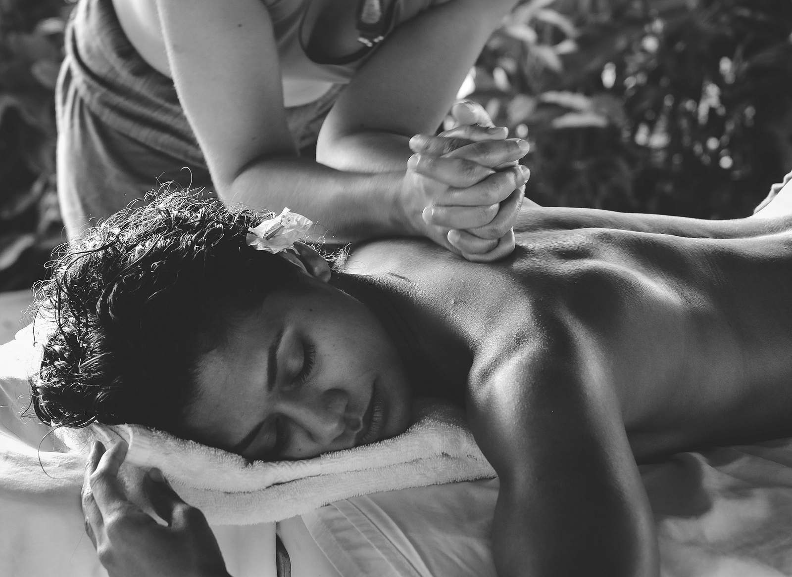 A rejuvenating back massage in a tranquil spa setting