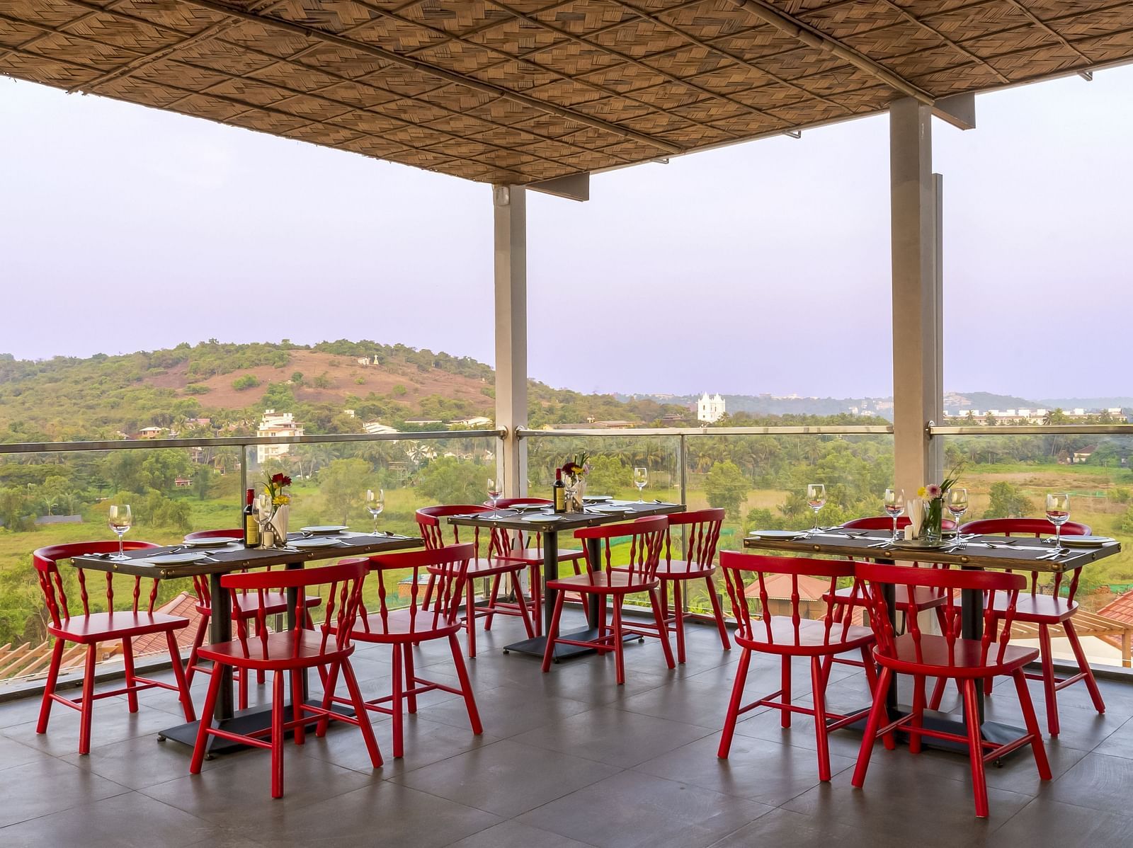 A al fresco seating arrangement inside the in-house restaurant - The Tanisi Hotels & Resorts, Goa