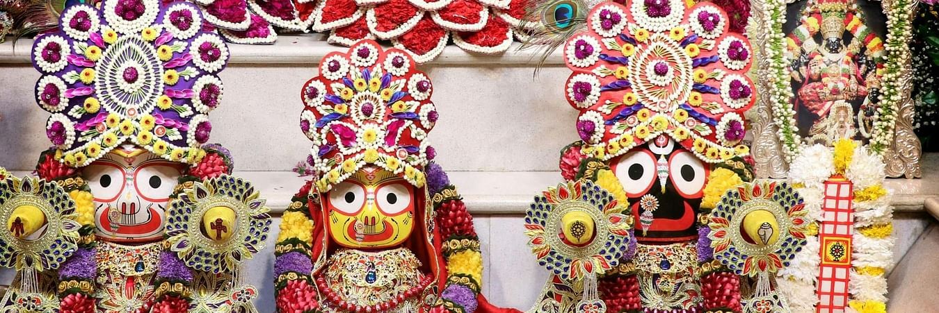 Colourful temple decorations with ornate religious artifacts and traditional festival arrangements