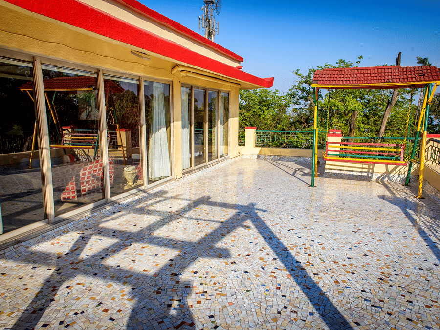 The terrace of the Royal Suite of the resort with a swing.