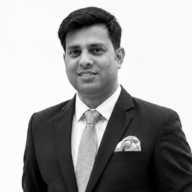 Yogesh Yadav Director Business Development (Sales) at BluSalzz Hospitality, wearing a formal suit and tie in a professional corporate portrait.