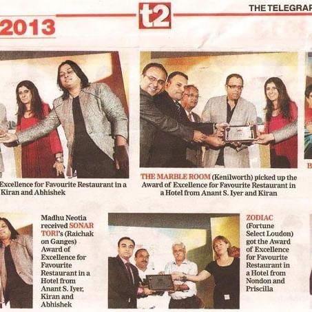 A newspaper food guide page from 2013 displaying several photos of people receiving awards and certificates at an event.
