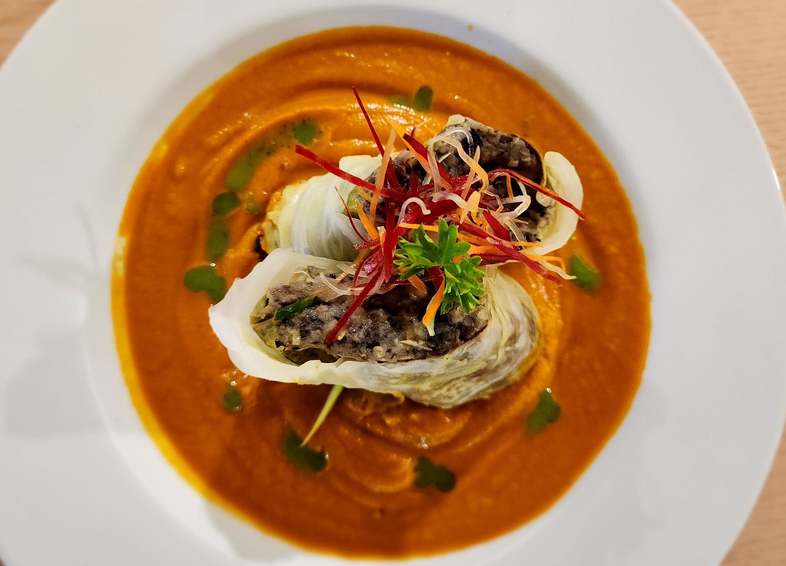 An elegant seafood dish swimming in a creamy sauce - Hotel 39, Jamaica