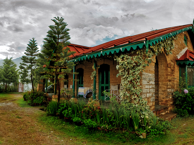 Facade and exterior of cottages captured during the day - Ramgarh Bungalows, Nainital.