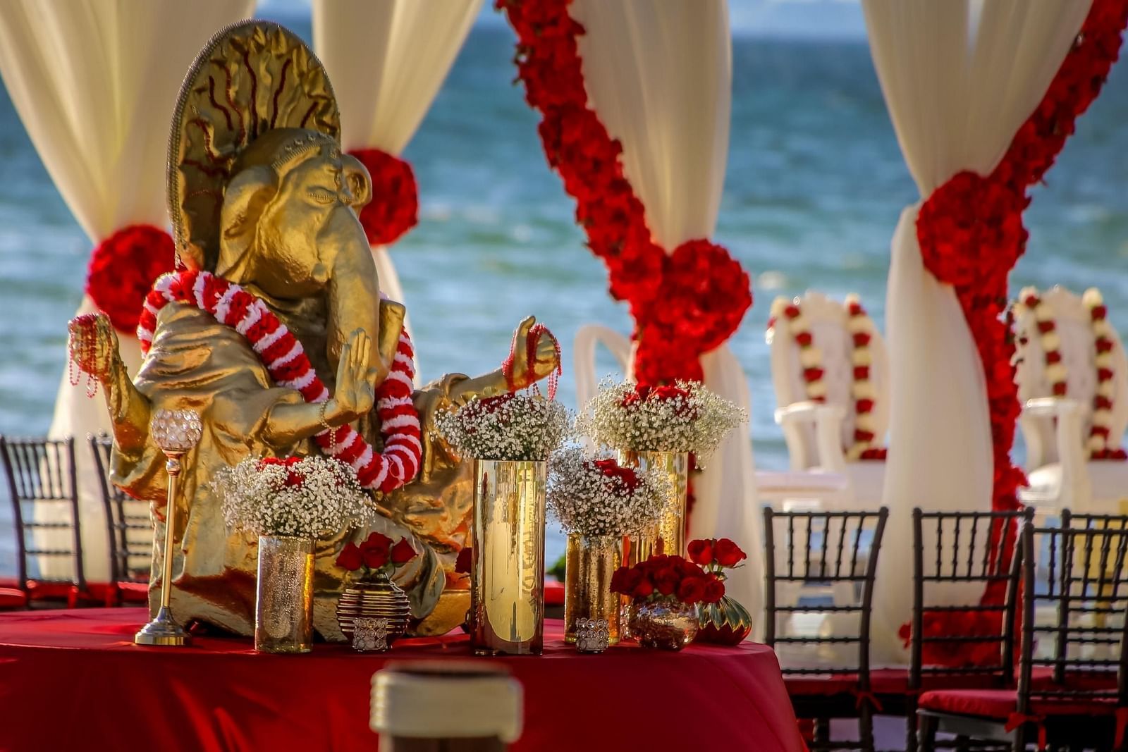 Red & White themed event by the beach - Rhythm Kumarakom