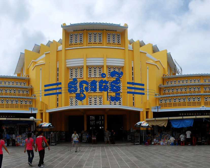 The historic Art Deco yellow building of Central Market - Phsar Thmey, a premier shopping landmark in Phnom Penh located just a short walk from Central Mansions.